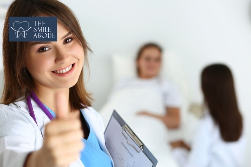 Dentist checking veneer shade for smile makeover in Gurugram